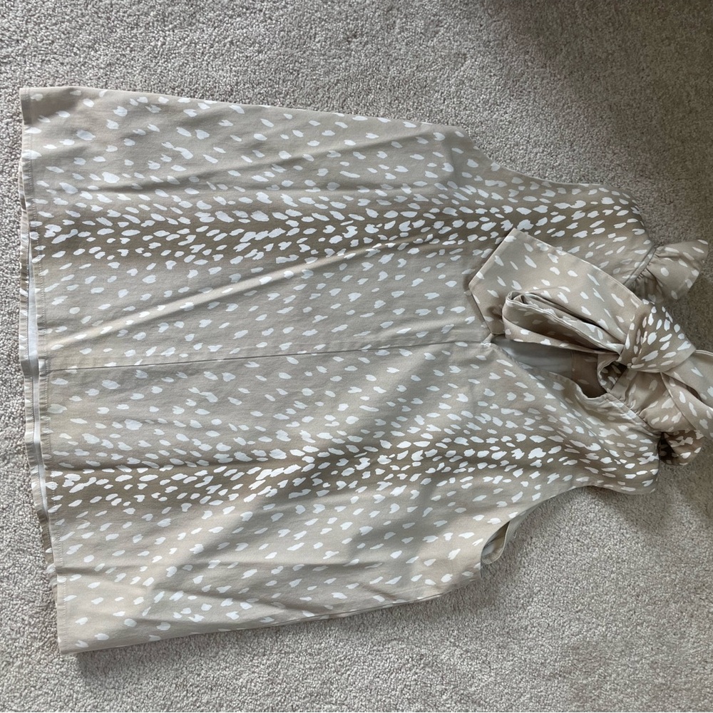Tuckernuck Mason high neck sleeveless blouse